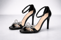 Elegant black patent stiletto heels