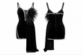 A glamorous black velvet mini dress with a fitted silhouette