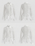 A lace blouse with a structured collar